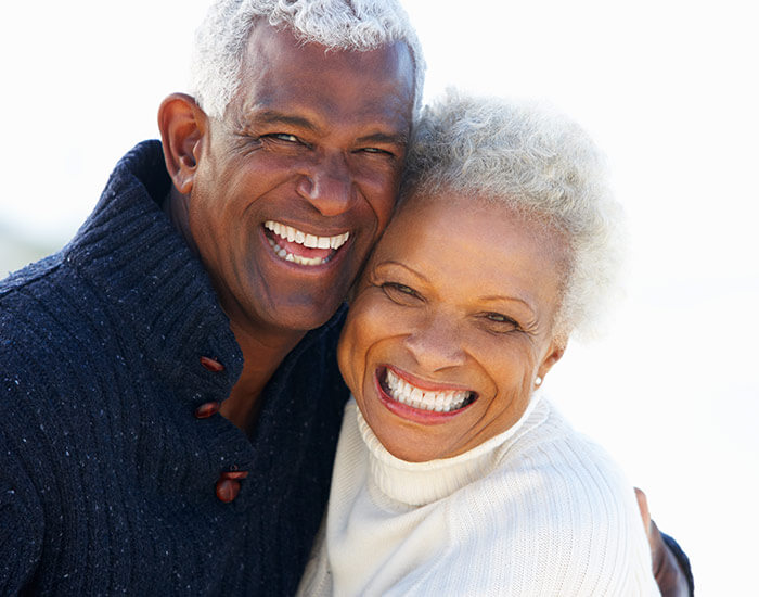old couple laughing and smiling